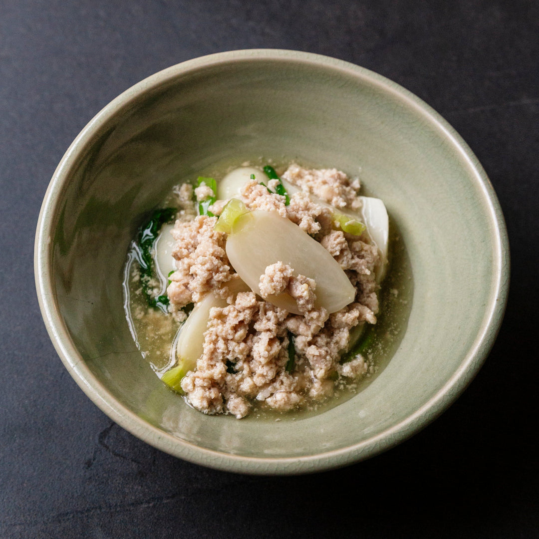 Hakurei turnips with crumbly chicken sauce in a Japanese serving bowl