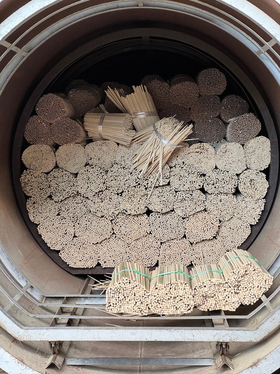 Bamboo chopsticks being dried and painted at Yamachiku, Kumamoto, Japan