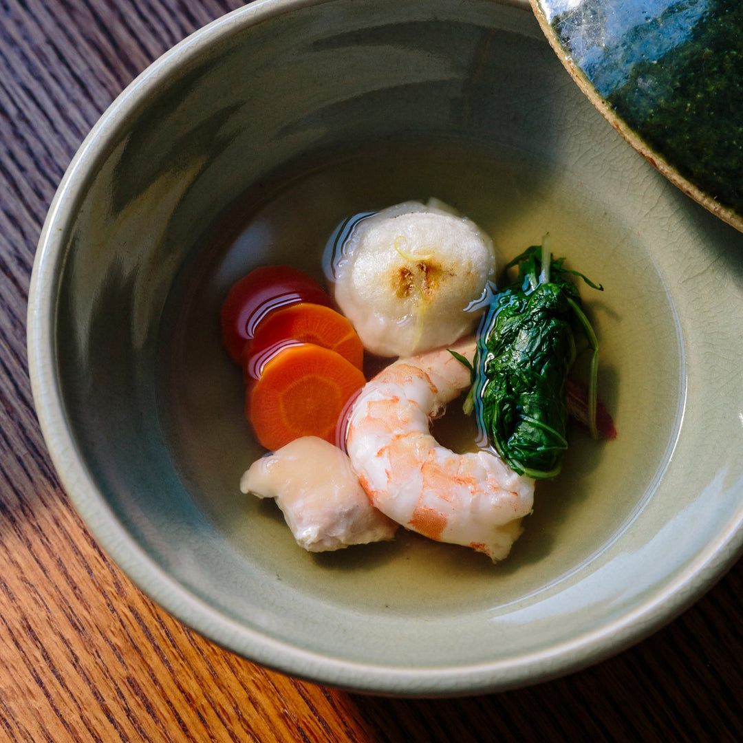 Ozoni — traditional Japanese New Year's mochi soup with konbu dashi and white miso