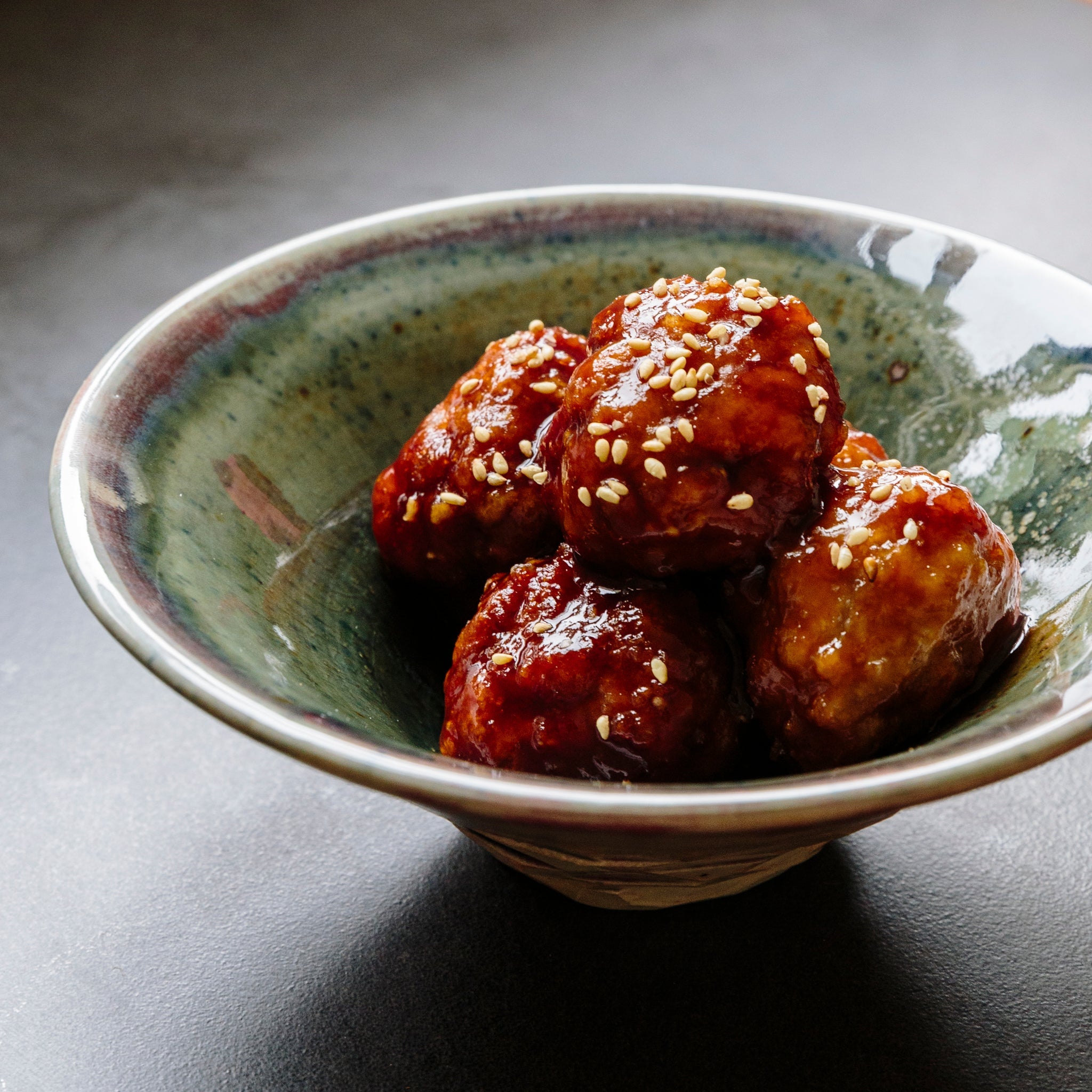 Japanese sweet and sour pork meatballs made with brown rice vinegar and soy sauce
