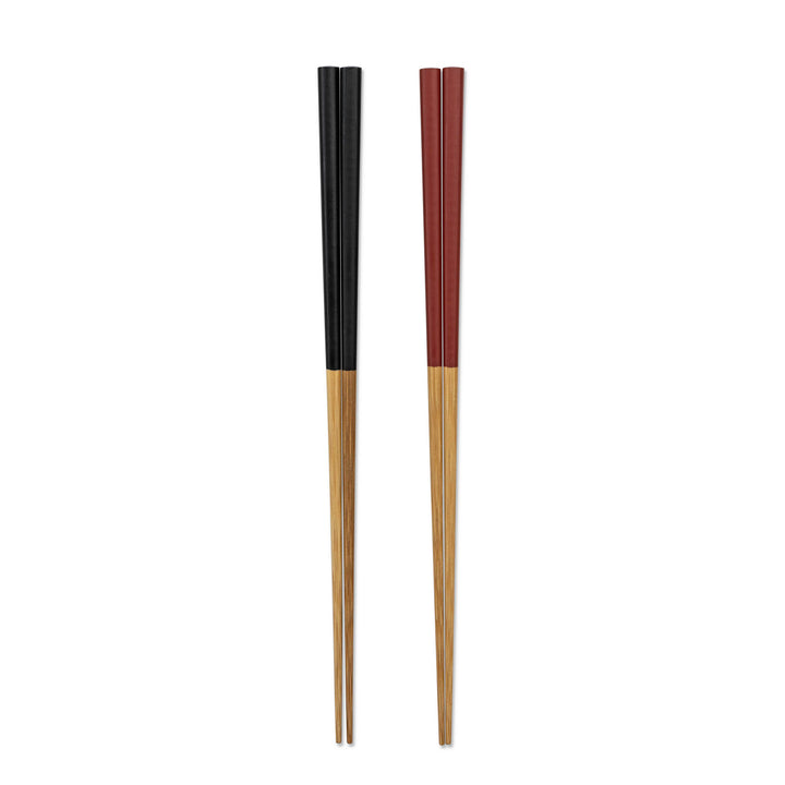 Pair of chopsticks with black and red accents on a white background