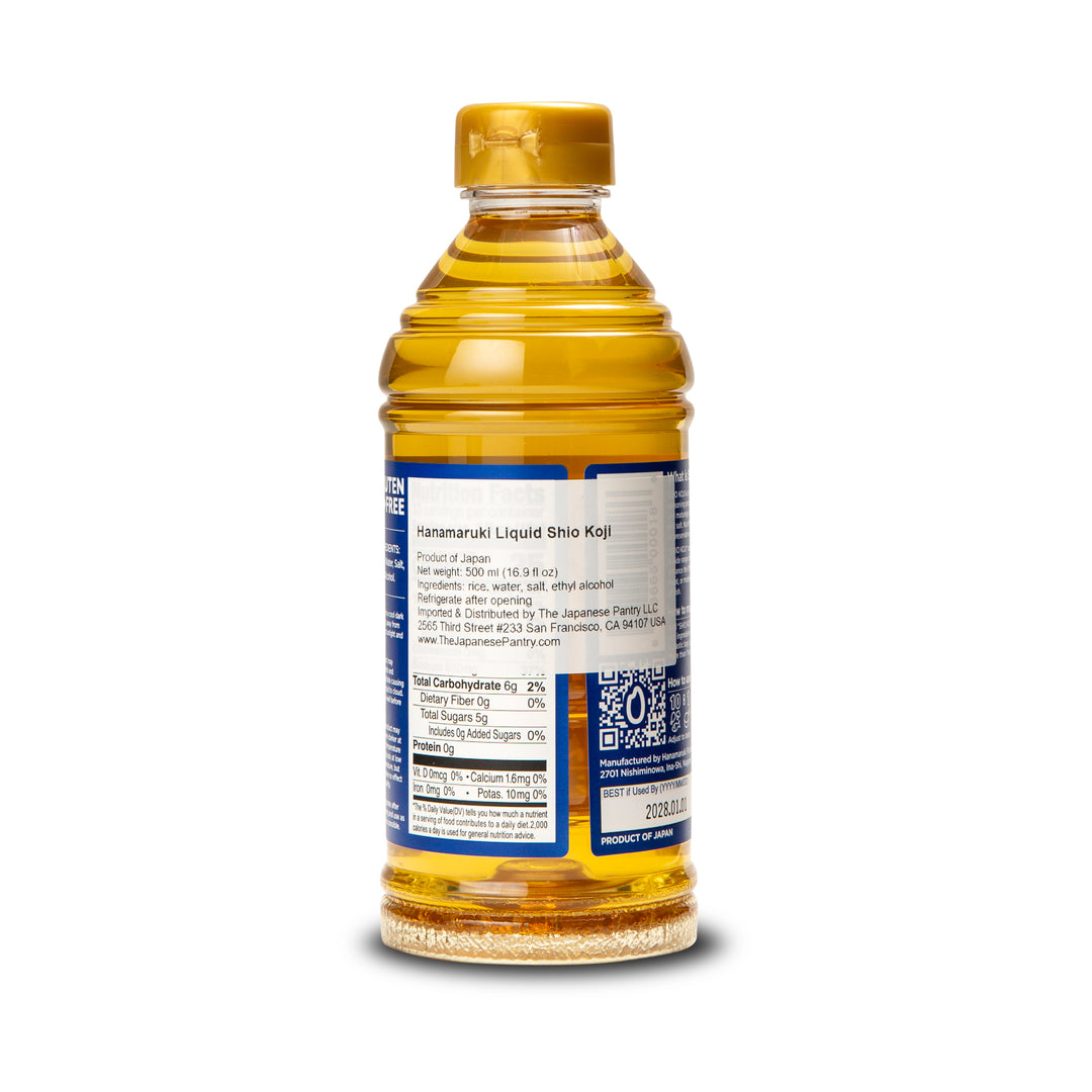 A bottle of Hanamuraki Liquid Shio Koji (salted rice vinegar) with a gold cap and a blue and white label, shown against a plain white background.