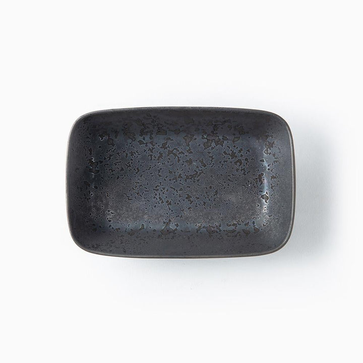 Black mottled rectangular ceramic bowl on a white background