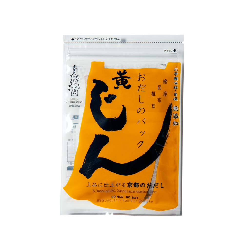 A packaged dashi mix product with Japanese text on the packaging, predominantly in a yellow and black color scheme.